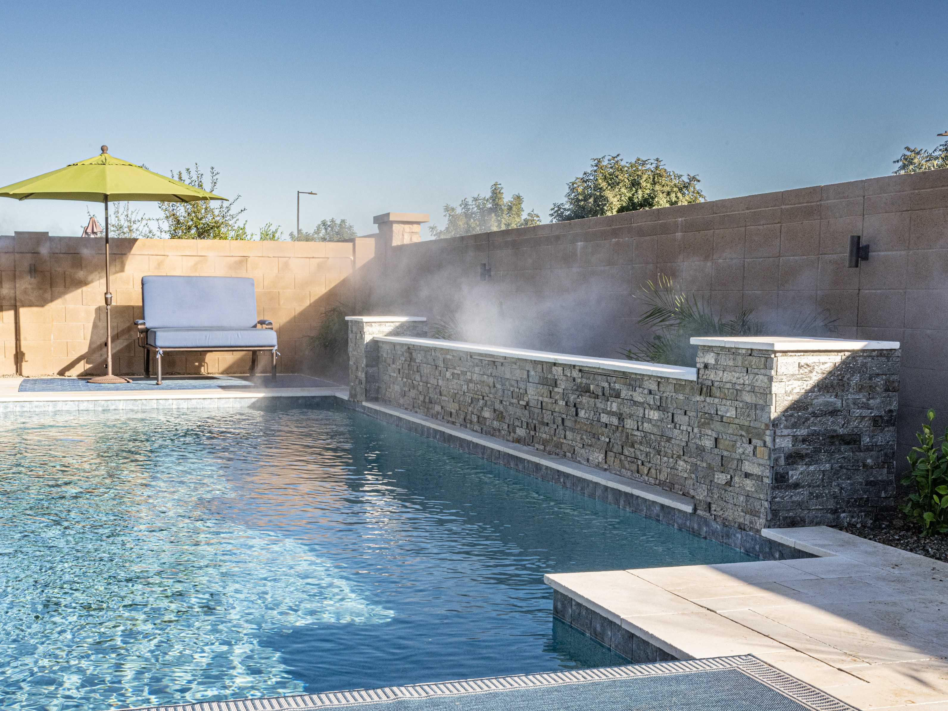 Patio misting system cooling an outdoor space in Chandler