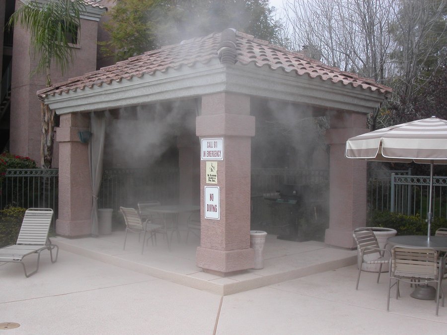Outdoor misting system cooling a commercial patio space in Chandler