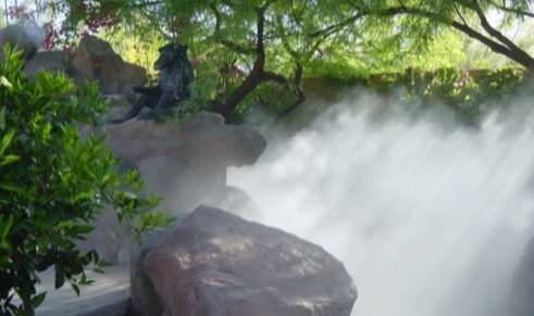 Patio misting system cooling an outdoor space in Phoenix