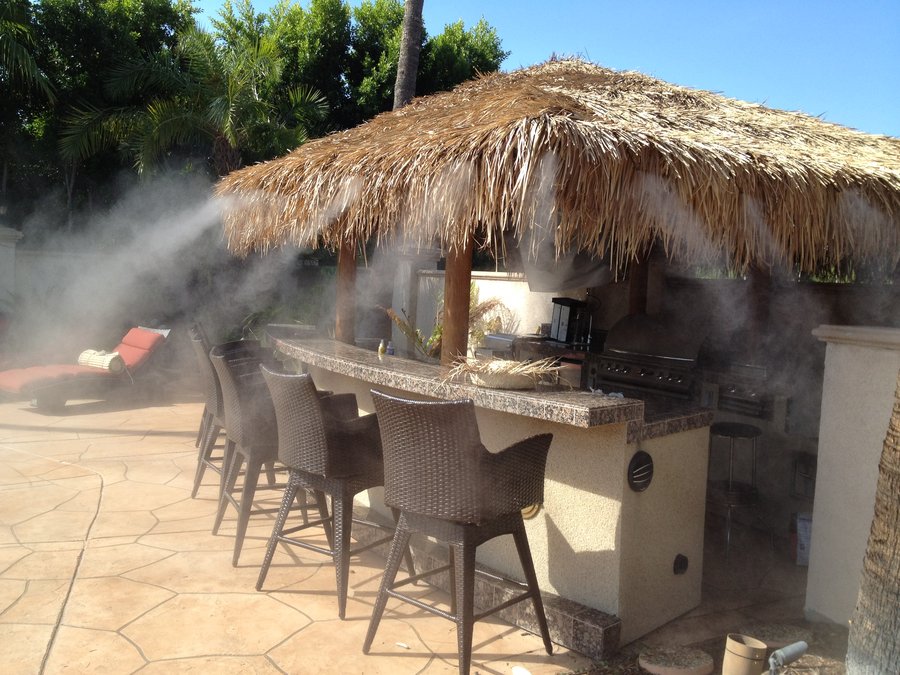 Outdoor misting system cooling a commercial patio space in Surprise